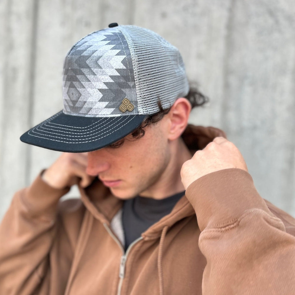 Five-panel low-profile graphic print Santa Fe Trucker Hat. Adjustable snap with mesh back. Made from organic cotton. *silver