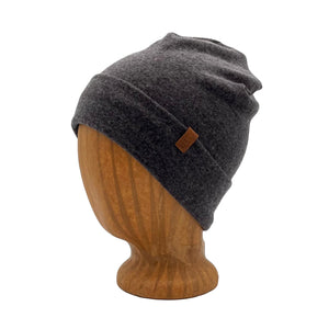 Eco-friendly beanie made in the USA from cotton blend fabrics. Worn with a cuff or without for slouch look *dark-grey