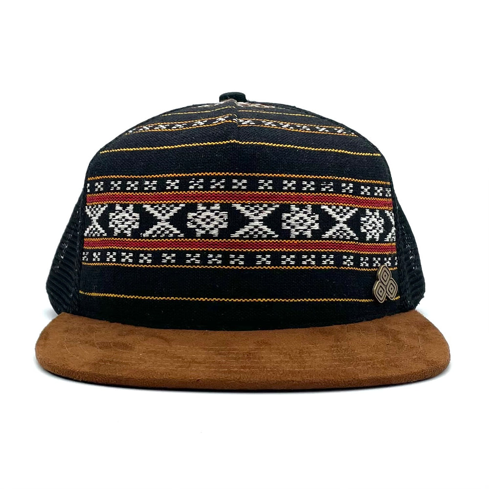 Five-panel low-profile Zuma Aztec unisex trucking hat. Hand loomed Indian cotton fabric and faux suede. 