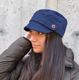 Short brim soft cap. Strap accent with button. Elastic band. Made in the USA from upcycled fabrics. *navy corduroy